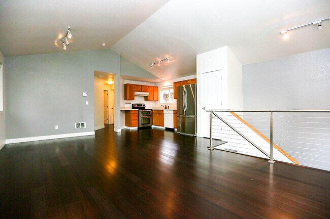 Enjoy the open floorplan with bamboo floors! - 7717 35th Ave NE