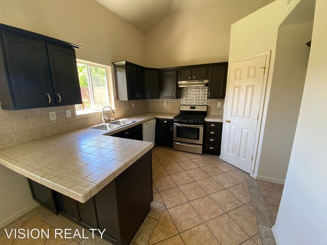 Building Photo - 3 br, 2.5 bath House - 7220 Desert Eagle Dr.
