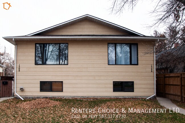 Photo du bâtiment - Quick Walk to Work or School from this North Lethbridge Half Duplex