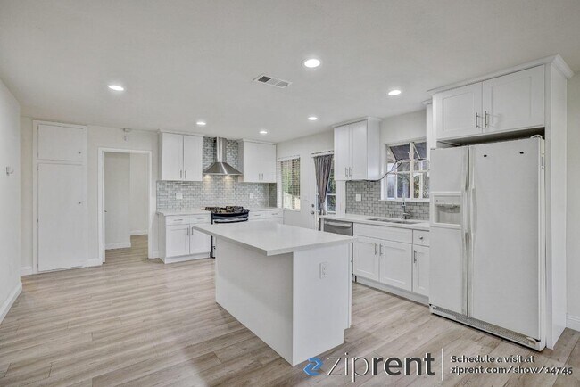 Building Photo - 9030 Ramona Ave