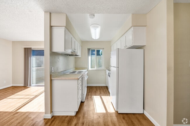 View from breakfast nook to kitchen. - Inglewood Oaks Apartments