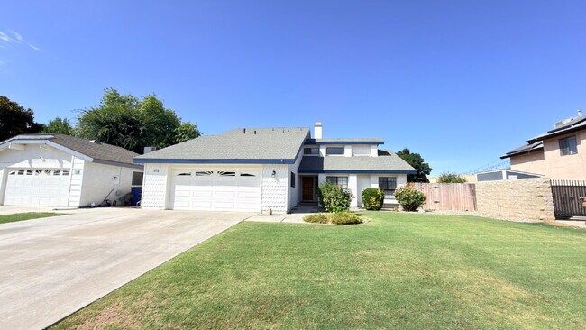Building Photo - Spacious Two-Story Home with Large Backyard – Available Now!