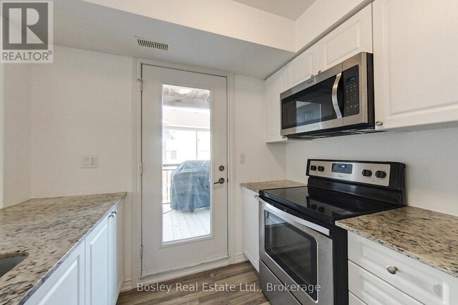 Building Photo - 2-202 Cove Ct