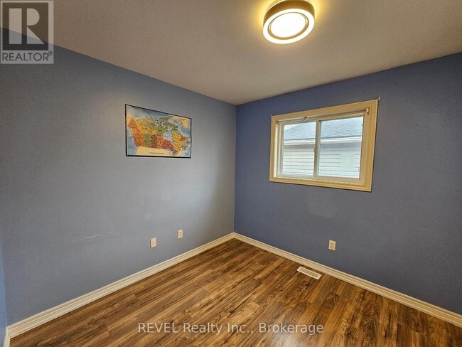 Building Photo - 5566 Highland Ave