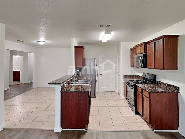 Foto del edificio - 9422 Ivory Trail Ln