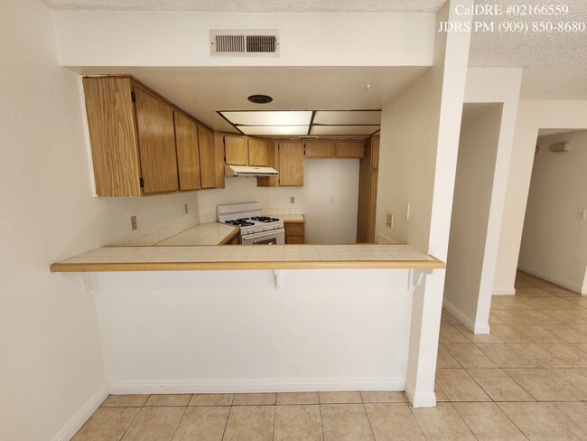 Building Photo - New Lowered Price! Alta Loma 3 Bedroom Condo