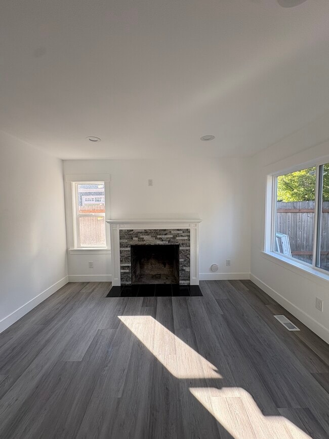 Cozy fire place and living room lots of natural lighting - 1435 S 128th St