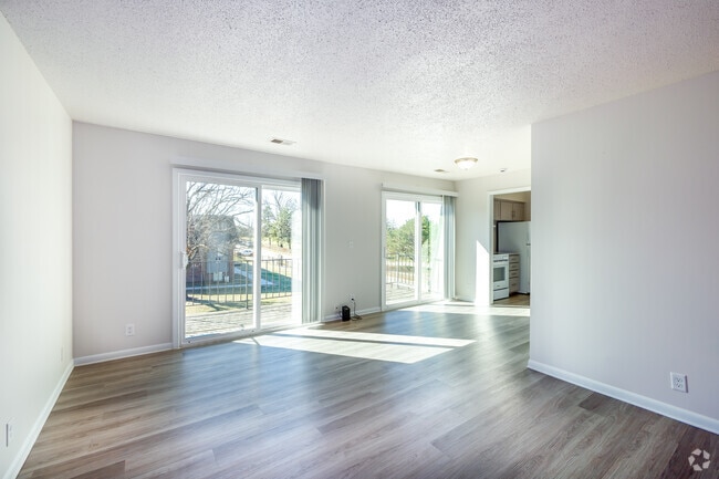 2BR, 1.5BA - 1,050SF - Living and Dining Area - Fairview Apartments