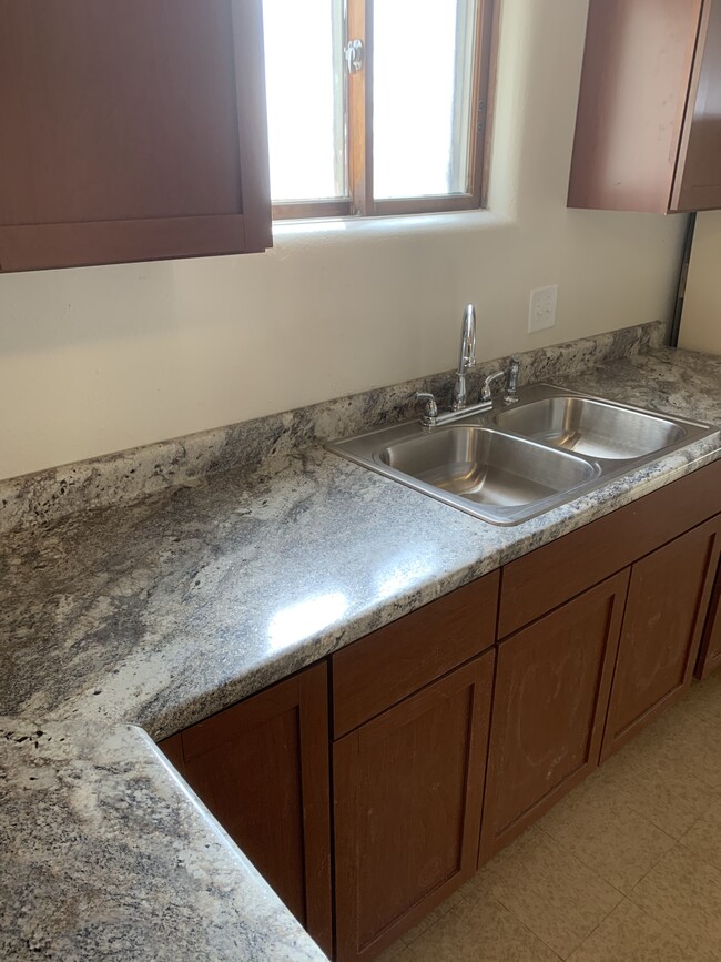 Stainless steel sink - 302 W 7th St