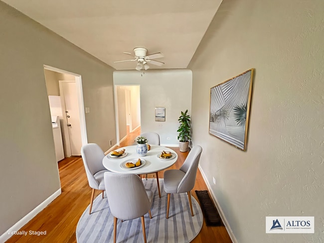 Building Photo - Charming 2 Bedroom Upper Unit onsite Laundry!