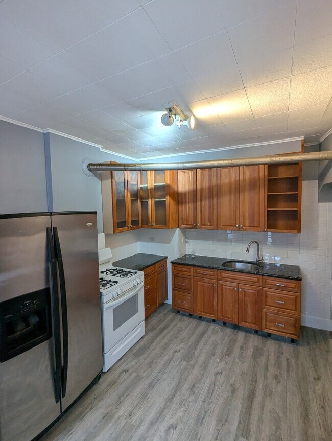 Building Photo - 11339 S Langley Ave