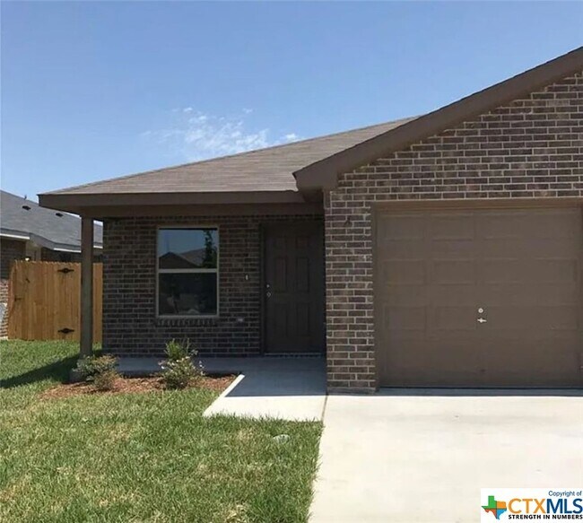 Foto del edificio - 6013 Amelia Earhart Blvd