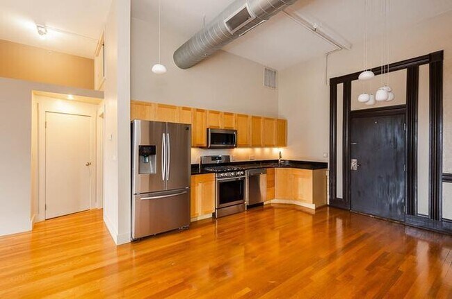 Building Photo - "Chic 1-Bed Condo in Vibrant Lynn: Modern ...