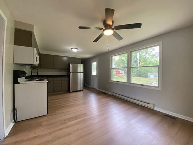Building Photo - Welcome to this charming three bedroom, on...