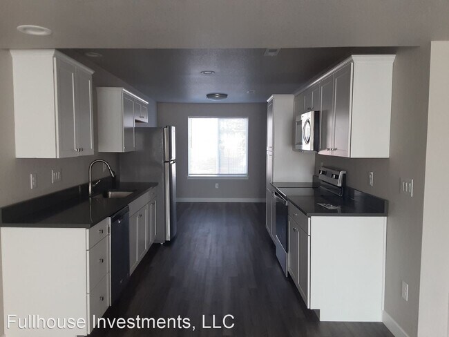 Building Photo - 8403-8459 W Hampden Ave