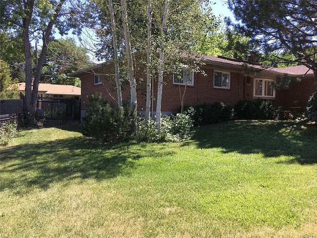 Front yard, eastside view - 11920 W Alameda Pky