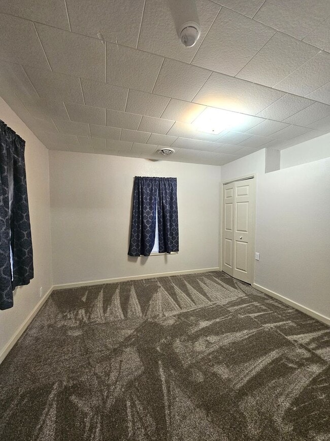 Building Photo - 4 Bedrooms, 2 Bathrooms with a Fenced Yard