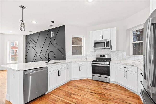 Foto del edificio - 6128 S Rhodes Ave