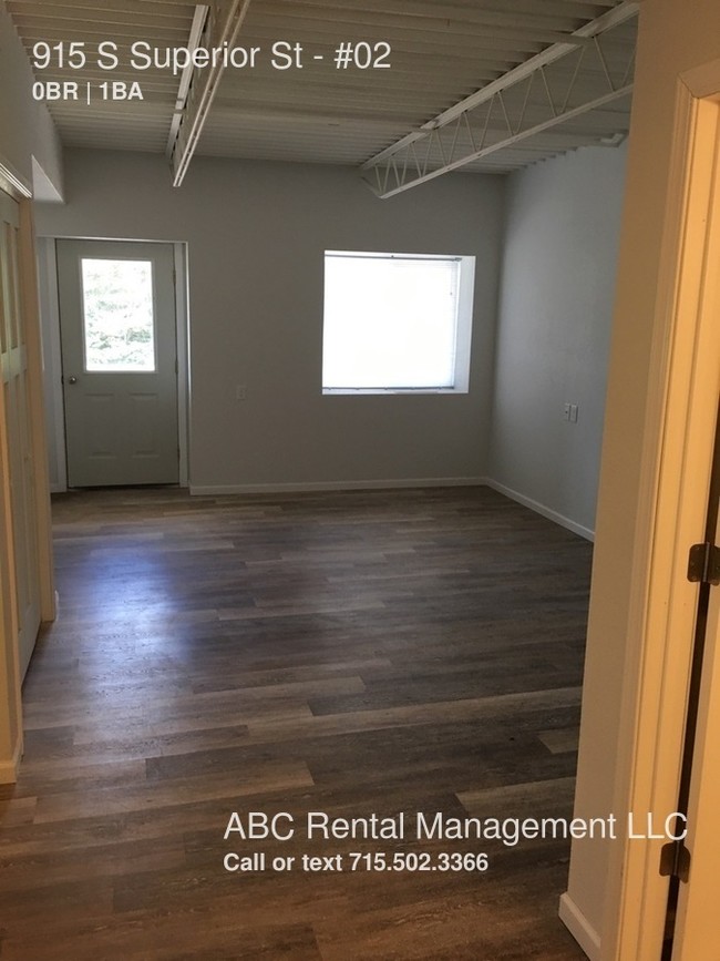 Building Photo - Retro-Modern Handicap Accessible Efficiency