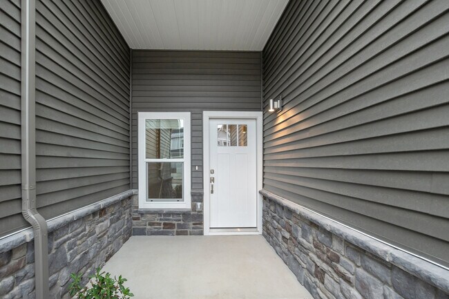 Building Photo - The Summit at Harvey Townhomes