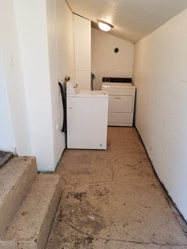 Building Photo - Gray House by Church