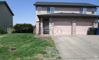 Building Photo - 702-704 N Cloverleaf Loop