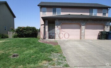 Building Photo - 702-704 N Cloverleaf Loop