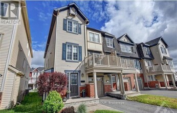 Building Photo - 445 Meadowhawk Crescent