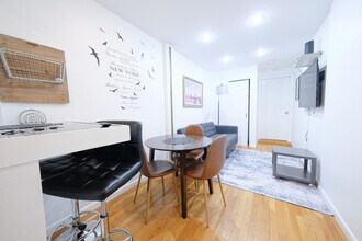 Building Photo - 305 E 104th St