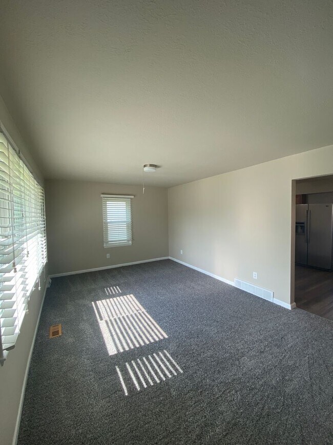 Building Photo - Updated 4 Bedroom with 2 Stall Garage