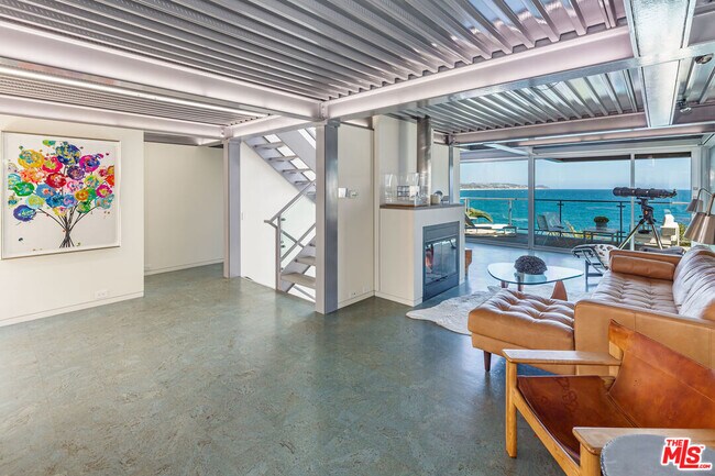 Building Photo - 6525 Point Lechuza Dr
