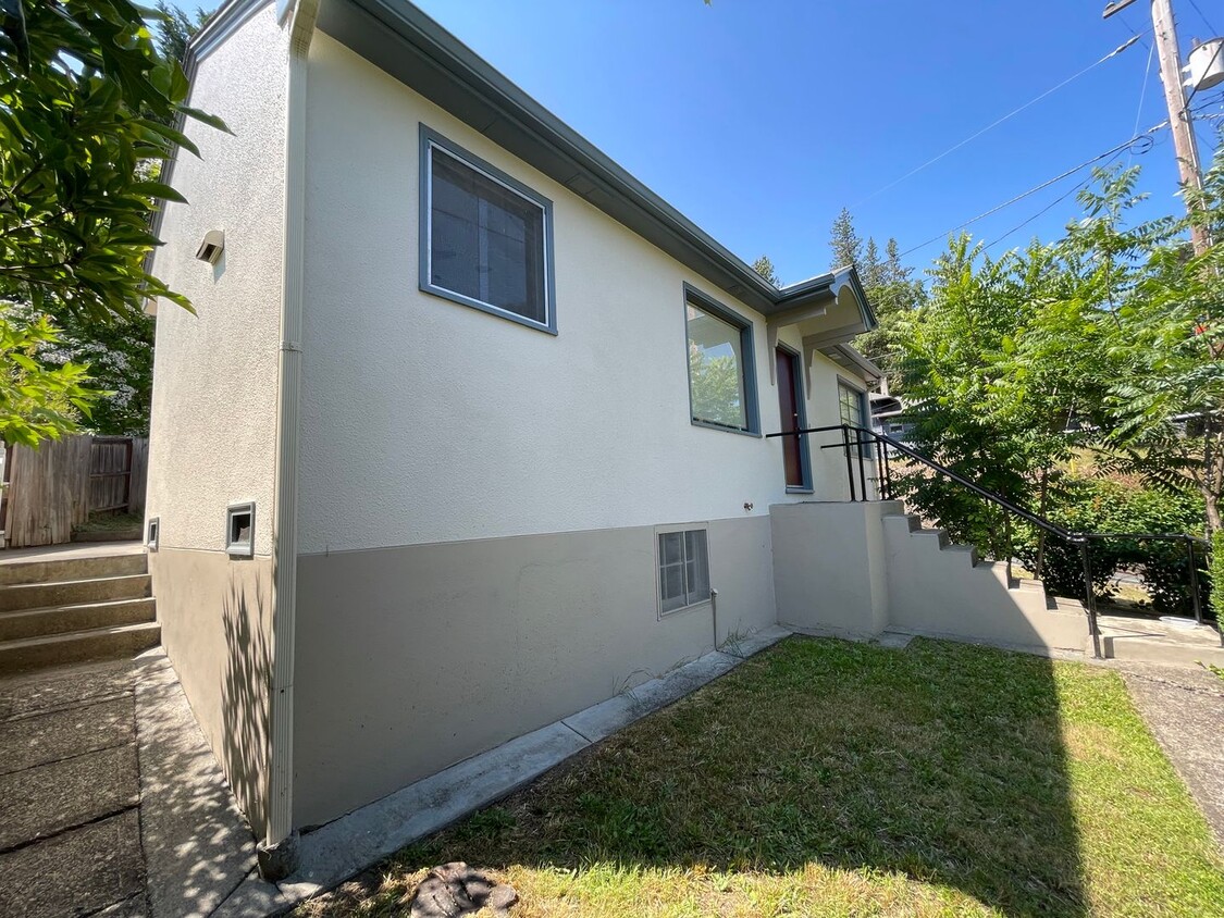 Primary Photo - 2 bedroom house with a basement and carport