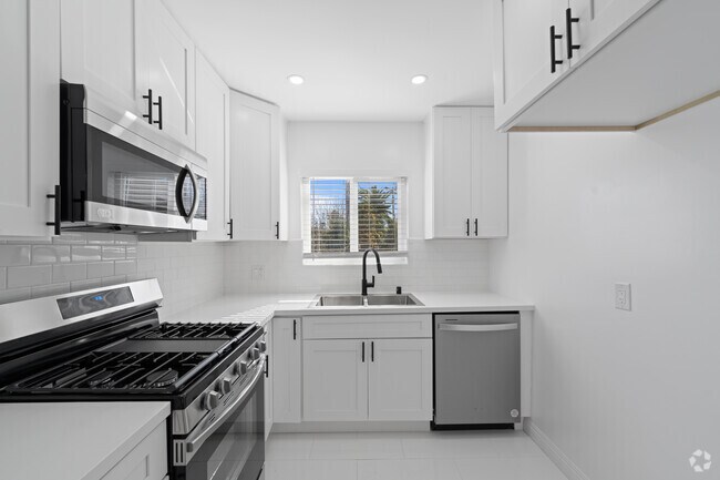 2 habitaciones, 2 baños - 900 pies cuadrados - Palm Gardens Apartments