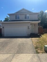 Building Photo - 3000 SE Rosespring Dr