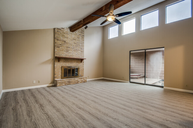 Main Room Features Fireplace and High Ceilings - 1903 Elsworthy St