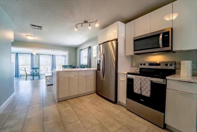 Building Photo - 4825 Floramar Terrace