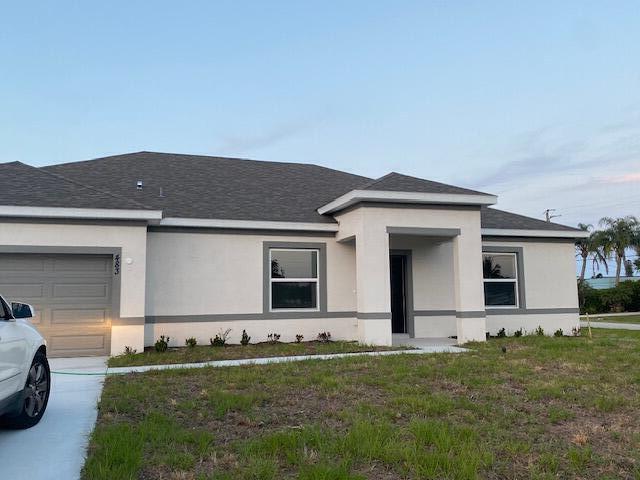 Photo - 483 Southeast Sunnydale Lane, Port St. Lucie, FL 34983 - 4 BR 2 BA Single-Family Home