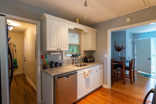 Kitchen with granite and stainless appliances - 1131 Magnolia Dr