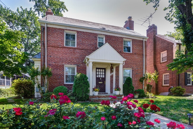 Beautiful brick housing with full roses in front - 7819 12th St NW
