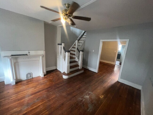 Building Photo - Oversized Classic Row Home w Wood Floors a...