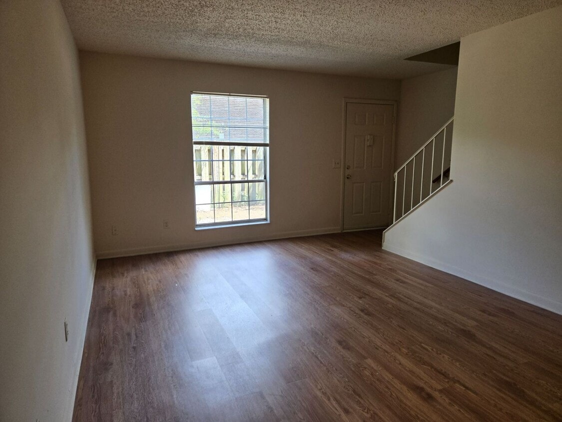 Primary Photo - 1 Bedroom, 1.5 Bath Townhouse