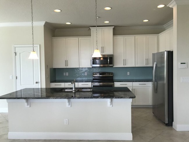 Building Photo - pending3/2.5 Model Townhouse In Aloma Trails
