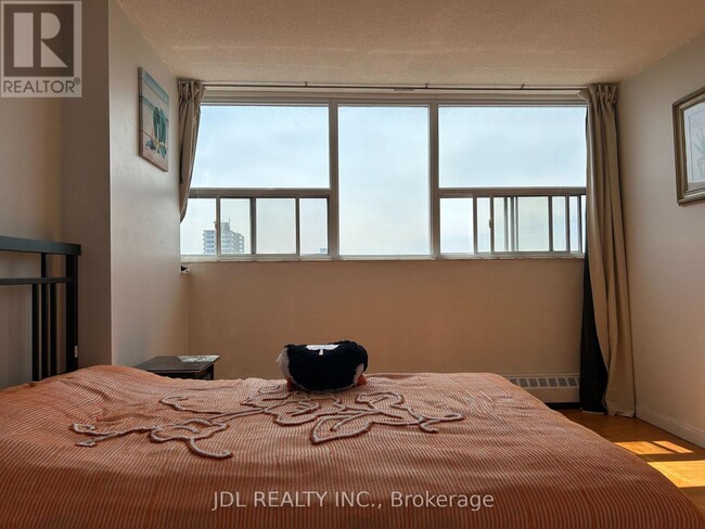 Building Photo - 4091-4091 Sheppard Ave E