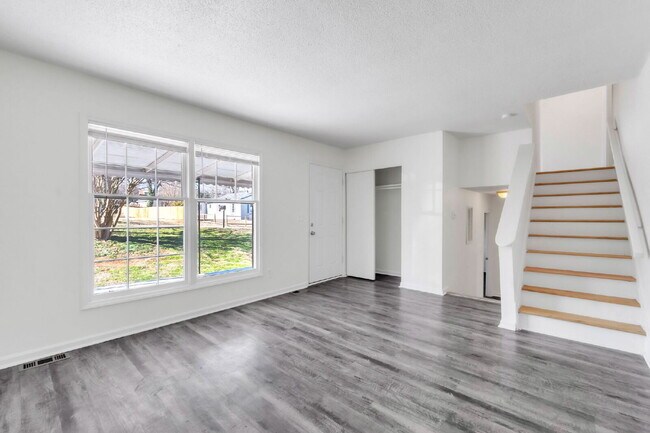 Foto del edificio - Spacious 4-Bedroom, 2-Bath Tri-Level Home with Multiple Living Levels $1675 /mo rent