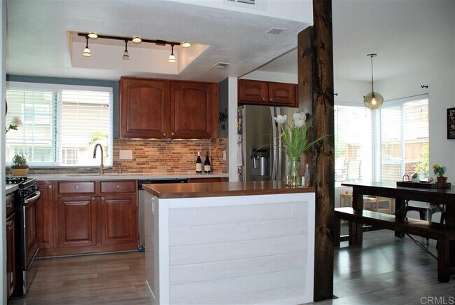 Butcher block island and recessed light - 2994 Brandon Cir