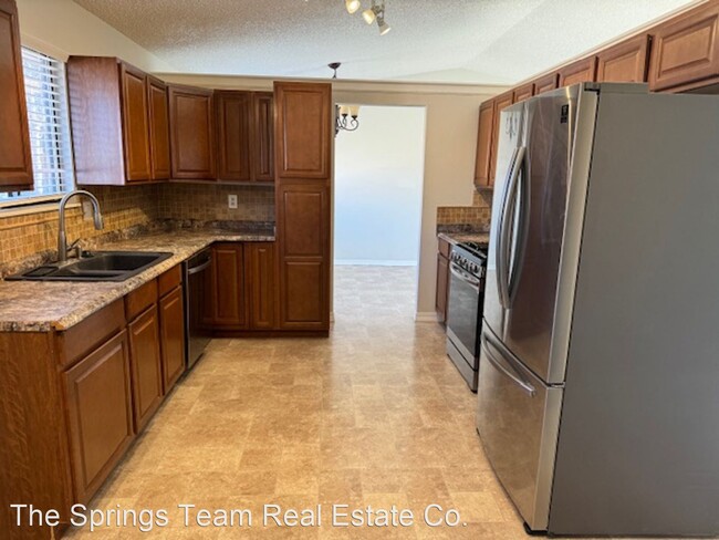 Building Photo - 3 br, 2.5 bath House - 7510 Woody Creek Dr