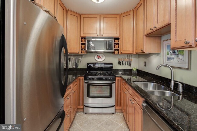 Kitchen with new appliances and dishwasher - 2475 Virginia Ave NW