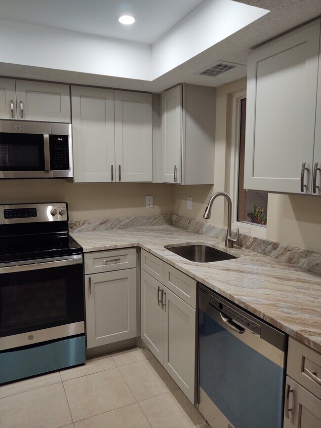 encimeras de granito - 1524 SE Royal Green Cir