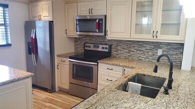 Building Photo - 10110 Boca Entrada Blvd