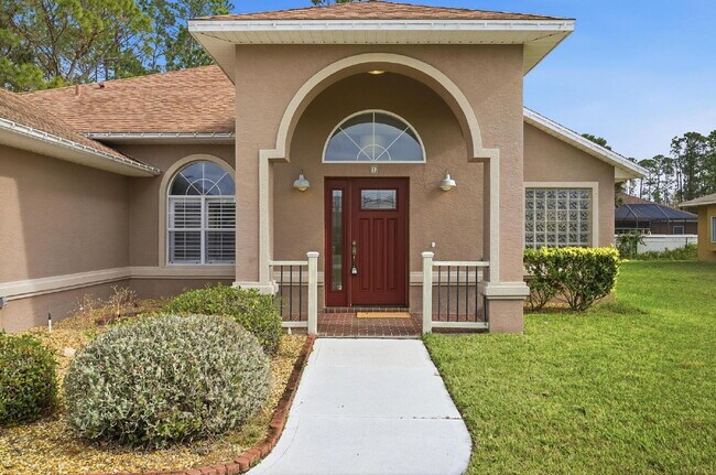 Building Photo - "Charming 3-Bedroom Home with 2 Full Baths and 2032 Sq Ft of Comfort in Palm Coast!"